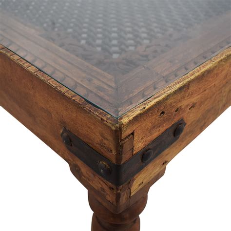 It flaunts a clear, tempered glass top and forged iron frame with subtle rings and curves finished in rustic bronze patina. 80% OFF - Vintage Coffee Table With Glass Top and Metal ...