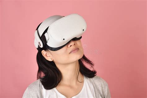 Asian Woman Using Vr Glasses Watching Movie And Playing Video Games