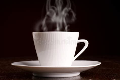Cup Of Steaming Hot Coffee Stock Photo Image Of Background 10041596