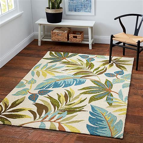My dog doesn't not consider herself an outdoor animal at 3 lbs she is probably right. Blue Grass Indoor/Outdoor Rug in Ivory/Multi | Bed Bath ...