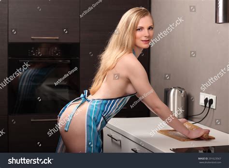 Erotic Nudes Woman Kneadling Dough Kitchen Foto Stok