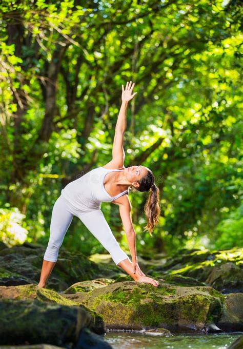 Beautiful Woman Practicing Yoga Outside In Nature Stock Image Image