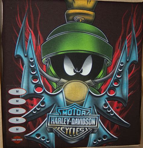 Check out the tattoo artist & studio who did the tattoo Looney Tunes T-Shirts - featuring Marvin the Martian ...