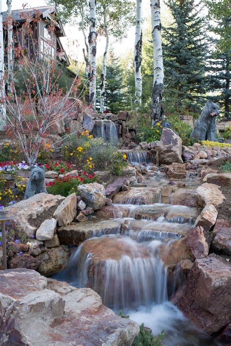 Waterfalls add the sight and sound of running water to your landscape. 15 Stunning Rustic Landscape Designs That Will Take Your ...