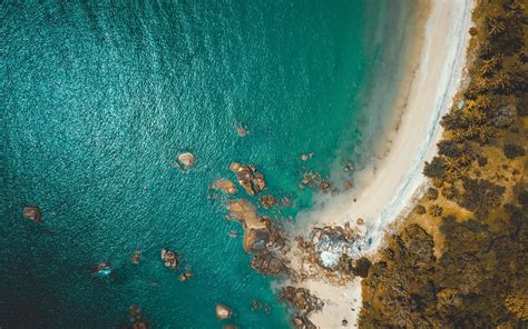 Download Wallpaper 1680x1050 Beach Coast Aerial View Sea Rocks