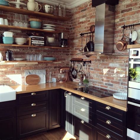 Check spelling or type a new query. Black cabinets, butcher block counters, brick walls, open ...