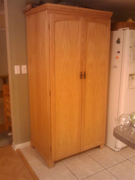 Medium pantry cabinets are taller than the small pantry but still clocking under 70 inches tall. Oak Kitchen Pantry Storage Cabinet | Tall kitchen pantry ...