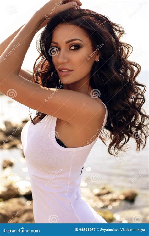 Woman With Long Dark Curly Hair Wearing Bikini And Beach Cl Stock Image Image Of Luxury