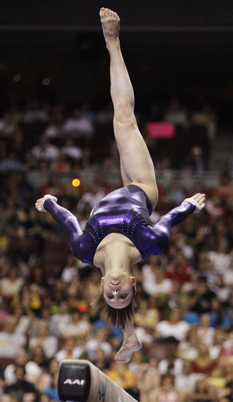 U S Gymnast Nastia Liukin Performs On The Uneven Bars During The