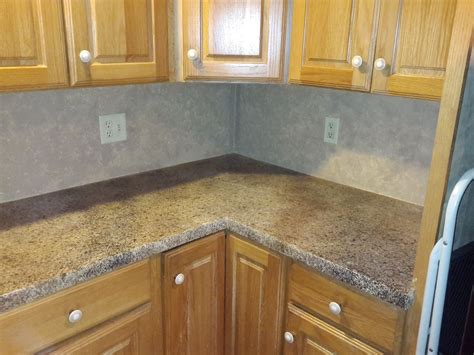 Want the look of a tile back splash, but the simplicity of a diy project? Linoleum Backsplash | nbizococho