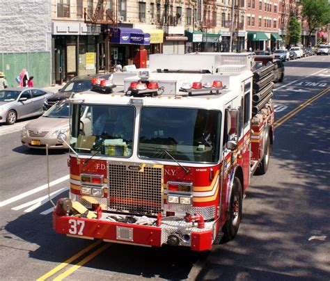 Fdny ladder truck extinguishing fires 9/11 8x12 silver halide photo print. FDNY Engine 37 Responding