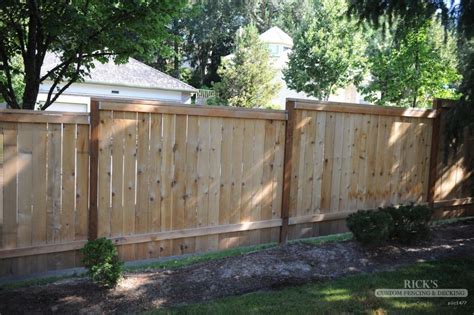 This Solid Style Cedar Fence Gains Some Height In Each Section