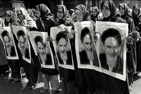 alfred yaghobzadeh photography iranian women marching with portraits ayatollah ruhollah