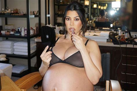 Pregnant Kourtney Kardashian Wears Sheer Bra As She Bares Baby Bump