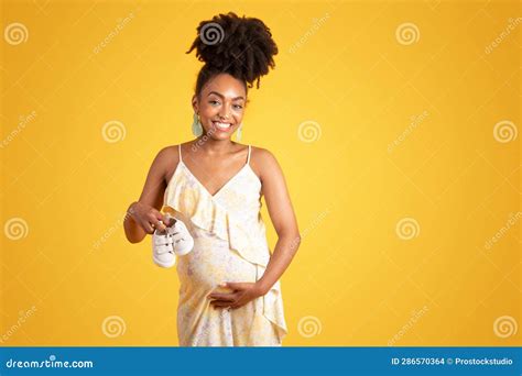 Cheerful Millennial Black Pregnant Woman Touching Big Belly Enjoy
