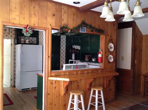 Professionally maintained & cleaned homes. Kitchen with pass-through/bar at Strawberry Lodge http ...