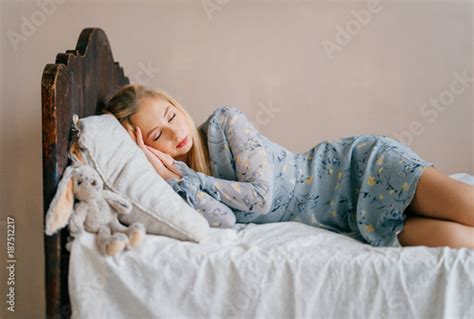 Young Beautiful Blonde Teen Sleeping On Vintage Wooden Bed Cute Lovely