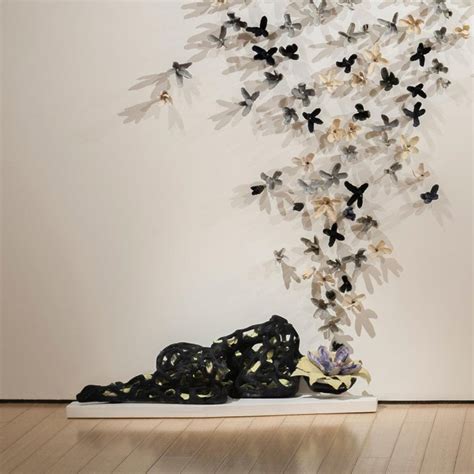 bradley sabin floral wall installation with figure 3 sets featured figure sold separately