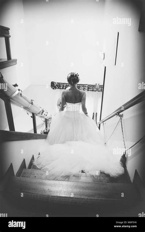 Elegant Woman Walking Down Stairs Hi Res Stock Photography And Images