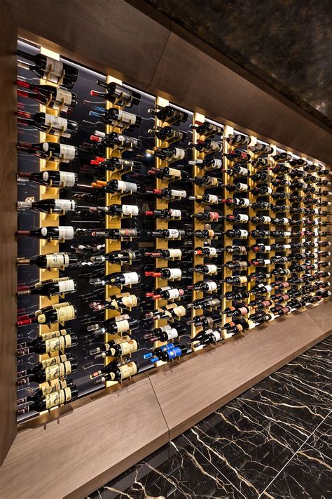 Wine Wall With Gold Aluminum Wine Racks And Custom Lighting Wine Wall