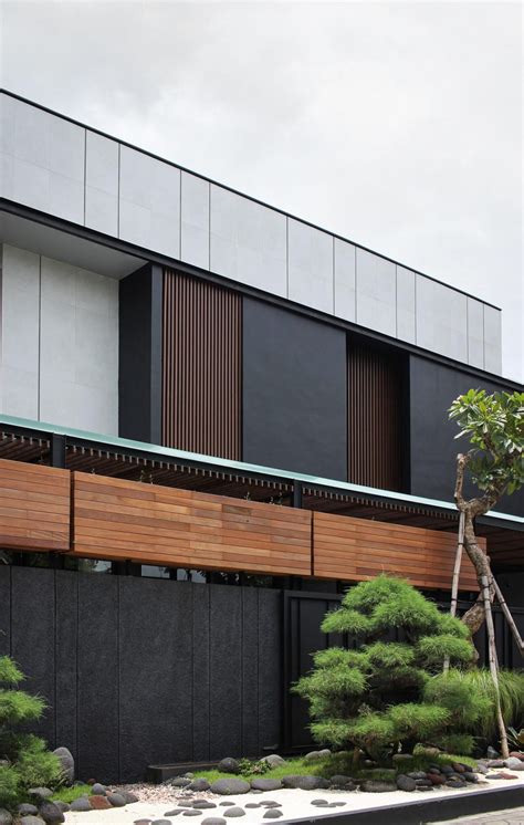 A Zen Garden Wraps Around The Corner Of This House