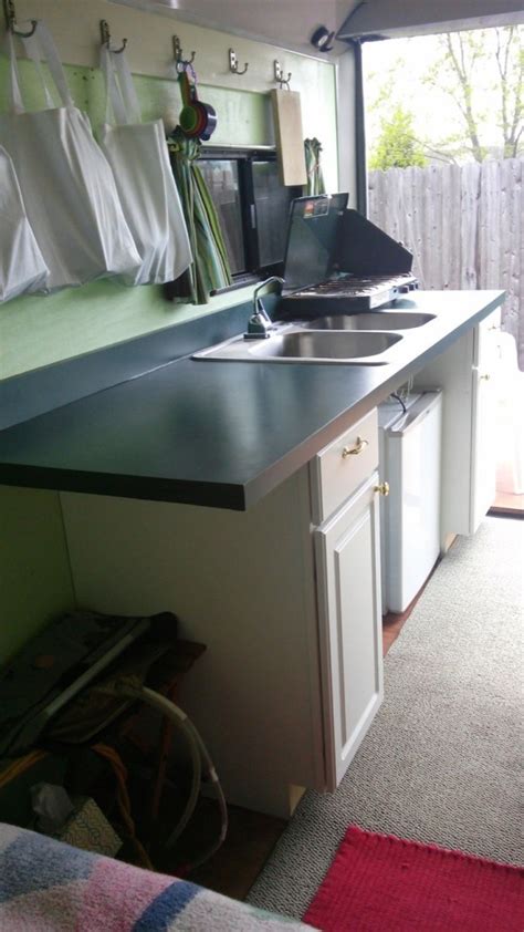 What is a conversion package. Woman Converts Cargo Trailer into Stealthy and Cozy Off ...