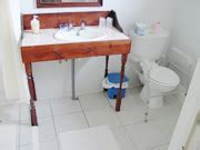 Specify a vanity designed for use from a wheelchair. Wheelchair-Accessible Vanity Details