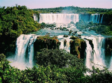 Iguazu Falls Located On The Border Of Argentina And Brazil Photo