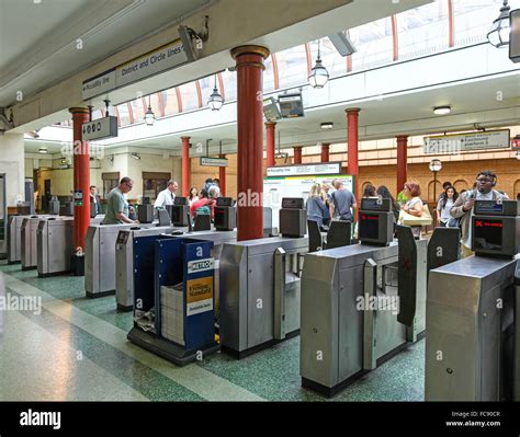 London Underground Tube Passengers At The Ticket Barriers At Gloucester