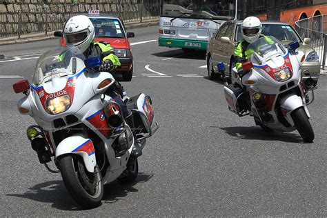 Motorcycles manufacture from hong kong: Pair of Hong Kong Police BMW motorcycles. | couple of Hong ...