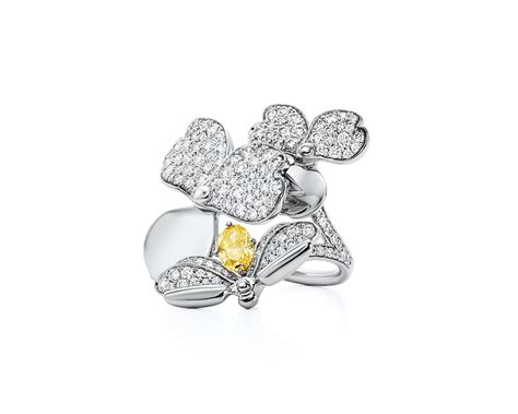 We always strive for new interpretations, combining beauty with modernism, like in the tiffany paper flowers collection. Tiffany Paper Flowers yellow diamond firefly ring in ...