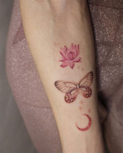 Butterfly Crescent Moon And Lotus Flower Tattooed On
