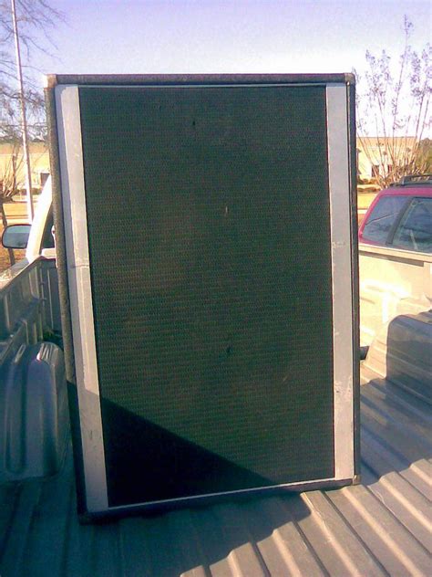 One 8 ohm cabinet and two 4 ohm cabinets = 1.6 ohms. old Peavey 4X12" cabinet | TalkBass.com