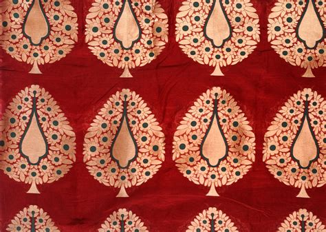 Red Ochre Banarasi Katan Georgette Fabric With Hand Woven Trees In