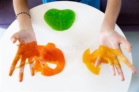 Movement Of Hand Holding Homemade Toy Called Slime Stock Photo Image