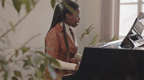 Medium Slowmo Of Young Talented African American Woman Playing Piano