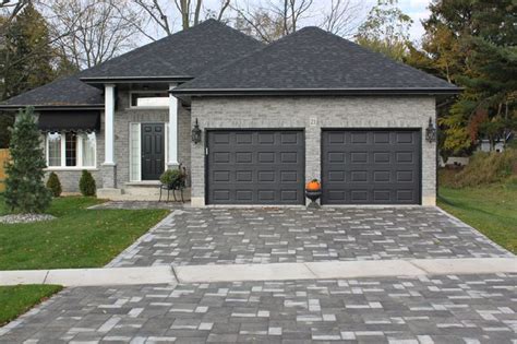 I need advice on a house with red brick on the bottom half and light gray siding on the upper half. Your garage door is one of the hardest working parts in ...