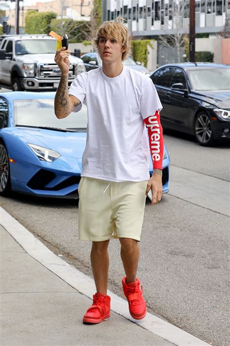 Justin Bieber Wears Kanye Wests Red October Sneakers At Gym — Pics