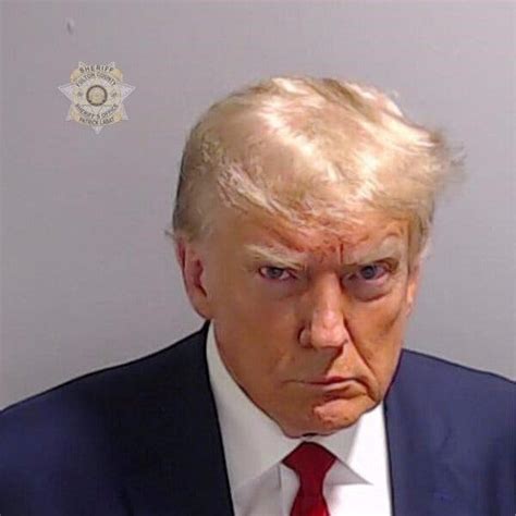 Trumps Mug Shot Is Released After Booking At Fulton County Jail The