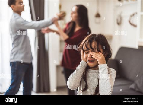 Little Girl Crying Because Of Her Parents Quarreling Girl Abused With
