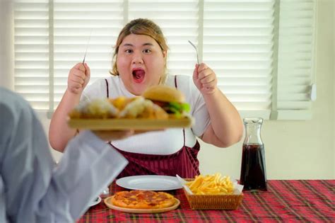 Plump Fatty Woman Hunger Enjoy Eating A Lot Junk Food With Another High