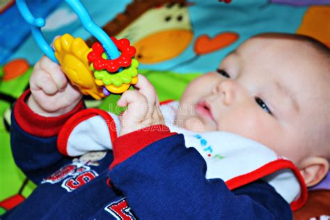 Great savings & free delivery / collection on many items. The Baby is Grabbing Toys! - Long Wait For Isabella