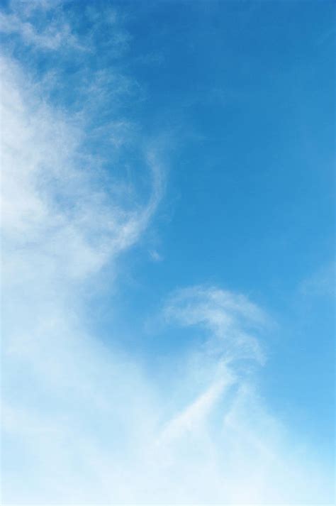 Wispy Clouds In Blue Sky By Stuart Mccall