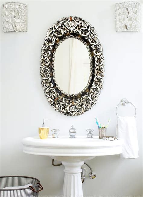 Glam Powder Room With Antique Oval Mirror Transitional Bathroom