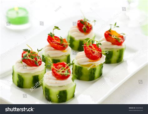 This link is to an external site that may or may not meet accessibility guidelines. Holiday Vegetable Appetizers With Cucumbers, Soft Cheese And Sun Dried Tomatoes Stock Photo ...
