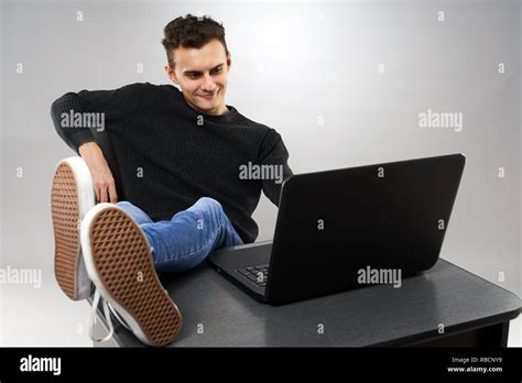 Happy Student Putting His Feet Up After Homework Stock Photo Alamy