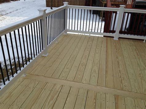 Check your deck for problems and get recommendations. 12x18 KDAT wood deck w/ feature board in the center ...