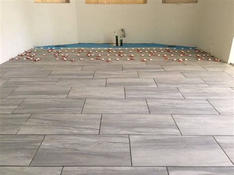 Give traditional subway tile a whole new look by installing it on the wall vertically! Staggered Floor Tile - Vintalicious.net