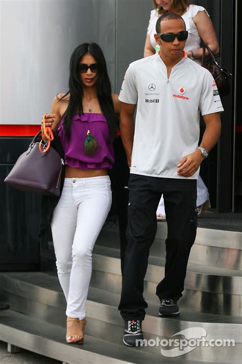 Official site of british formula 1 racing car driver lewis hamilton. Lewis Hamilton, McLaren Mercedes with his girlfriend ...