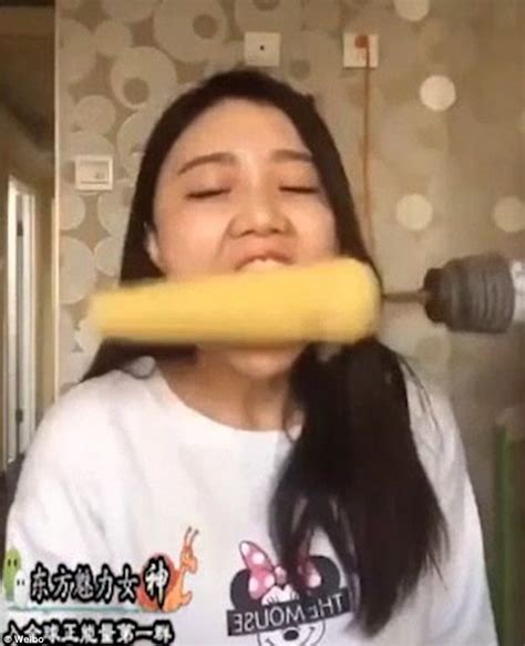 Woman In China Takes On Rotating Corn Challenge And Gets Her Hair